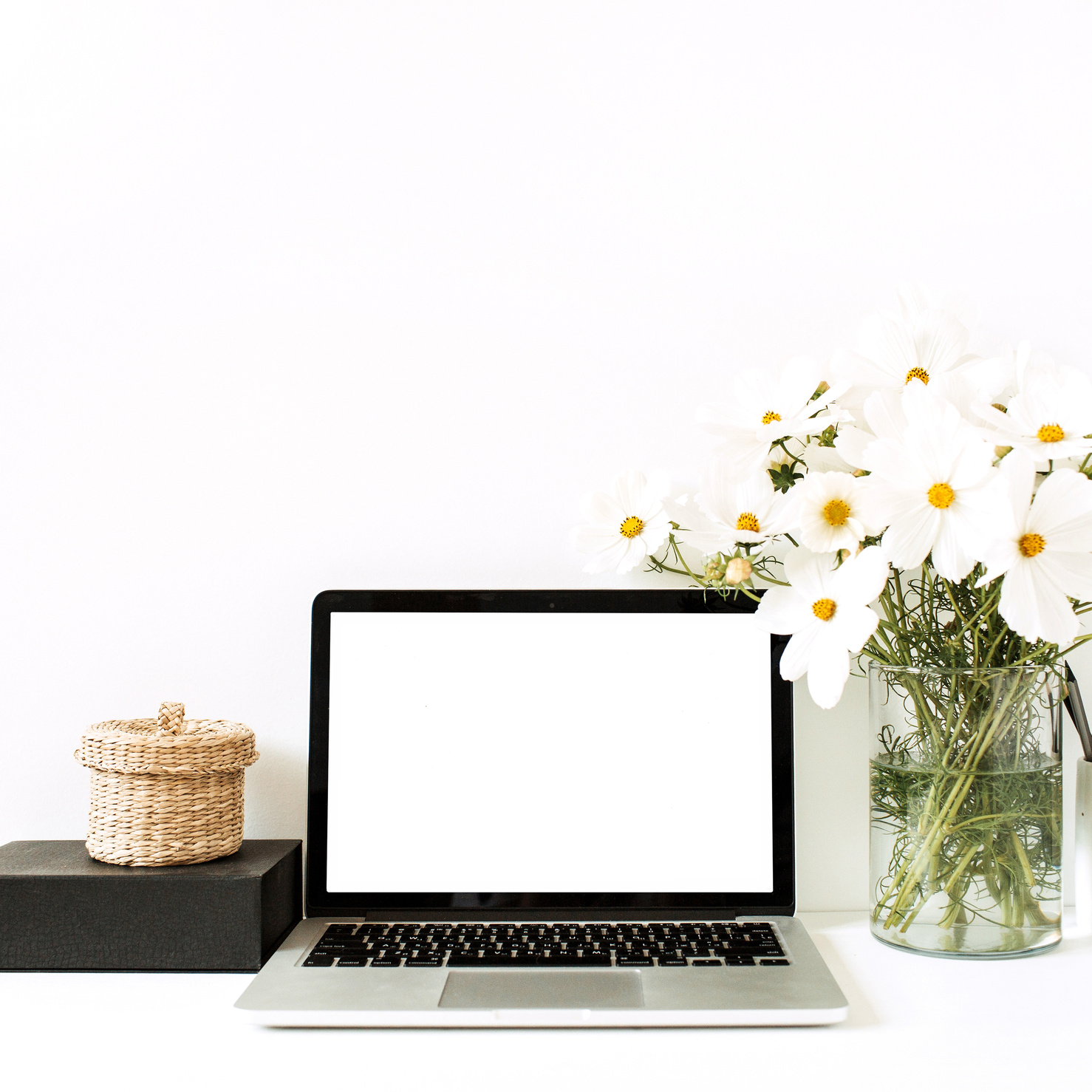 Blank Laptop Screen on Desk on White Background